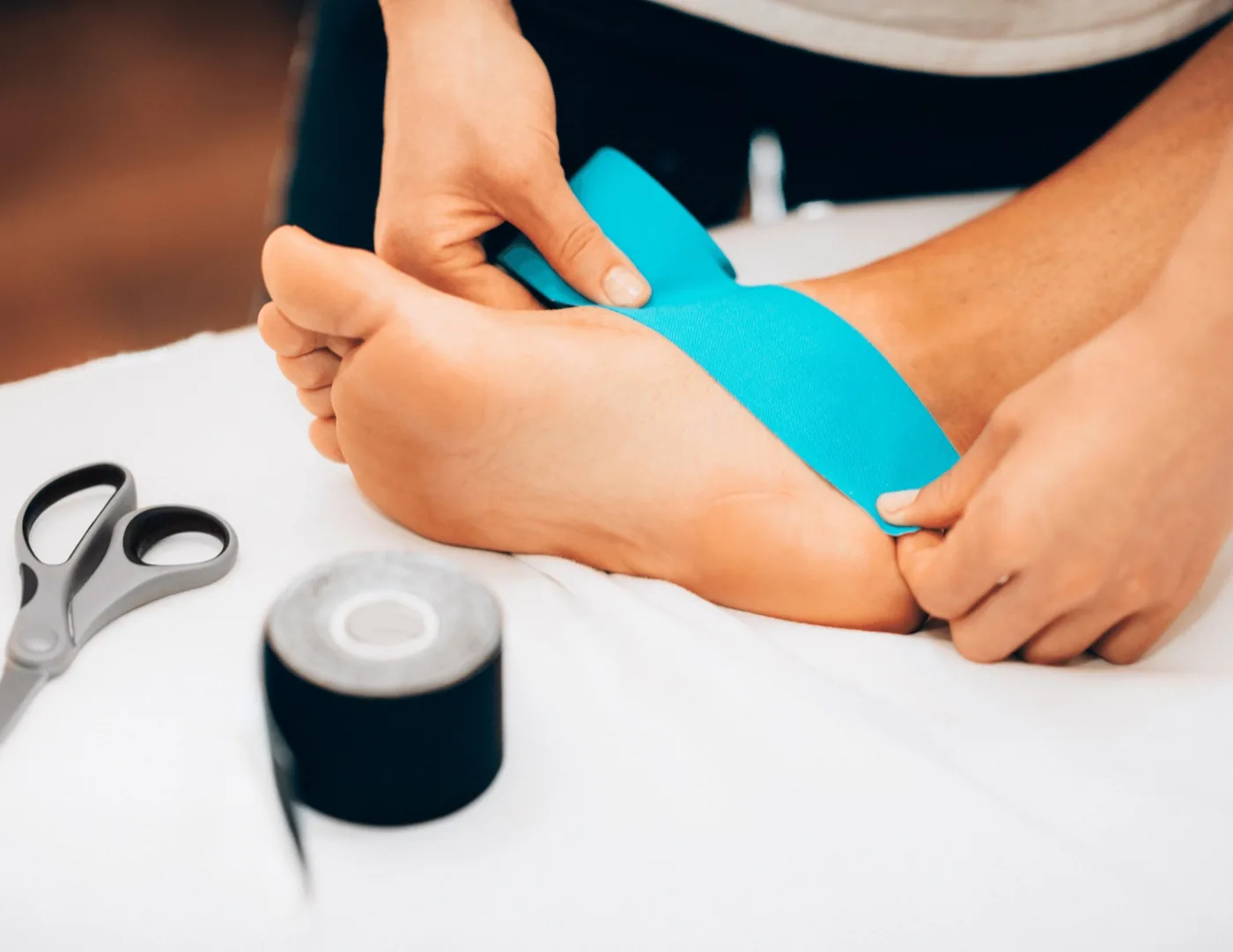 Kinesiology tape on a foot and ankle